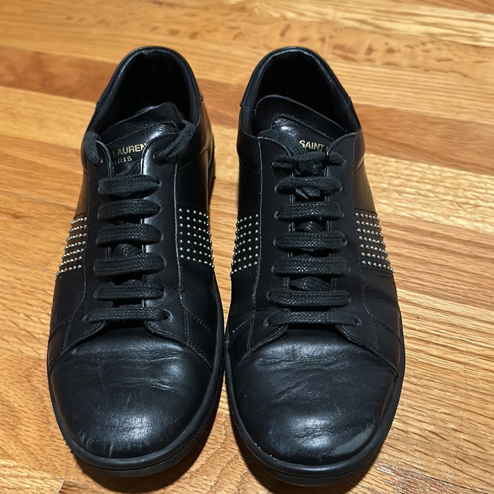Black Saint Laurent leather sneakers with rhinestone detail